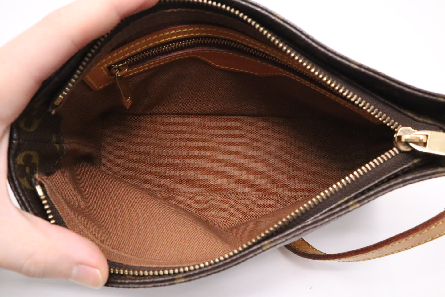 Louis Vuitton Trotteur in Monogram Canvas