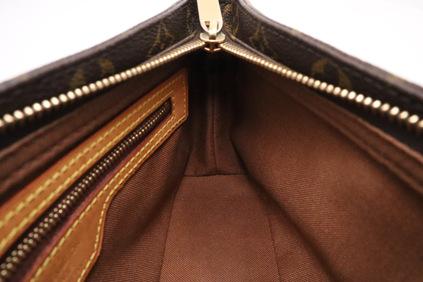 Louis Vuitton Trotteur in Monogram Canvas