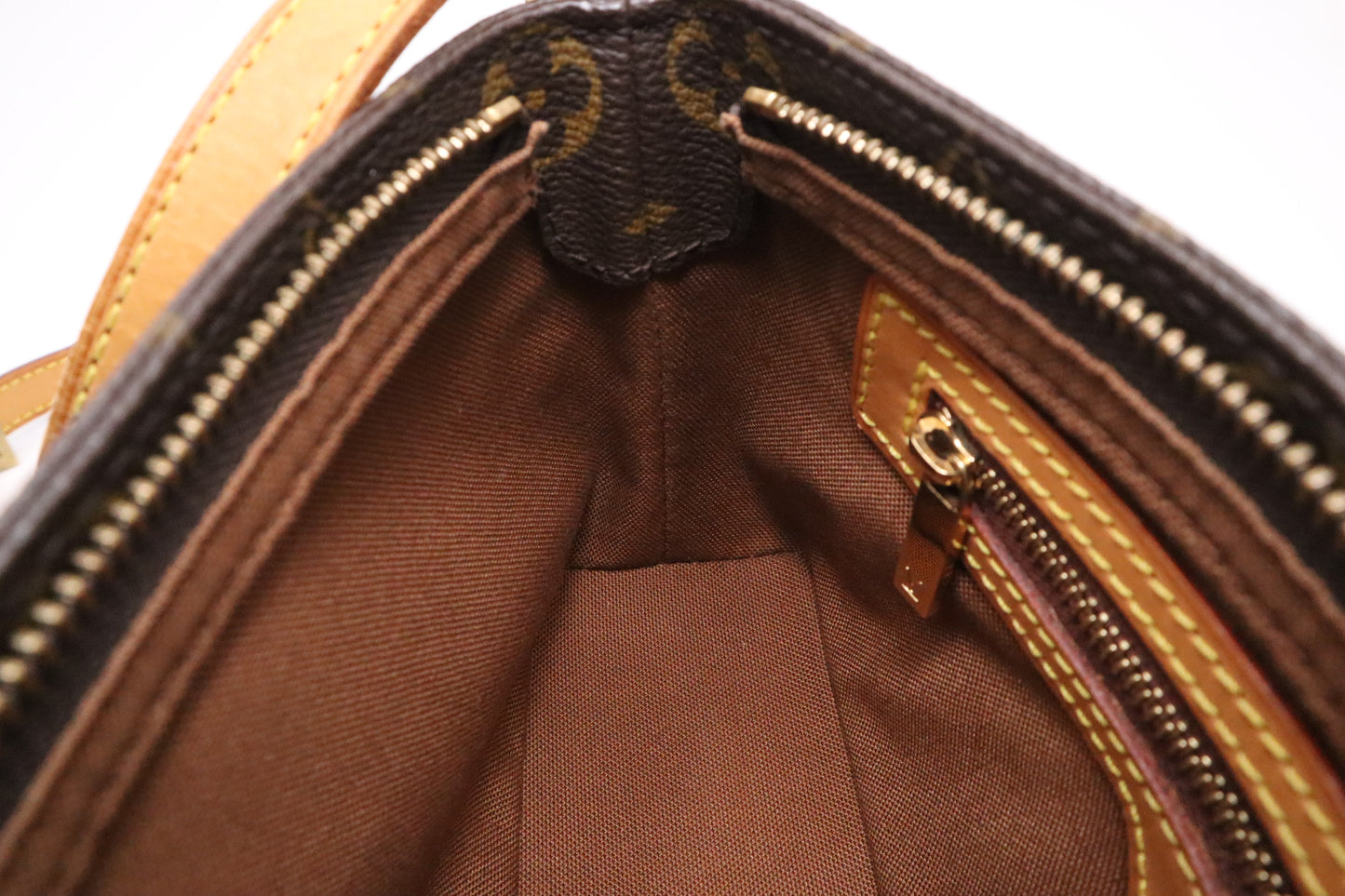 Louis Vuitton Trotteur in Monogram Canvas