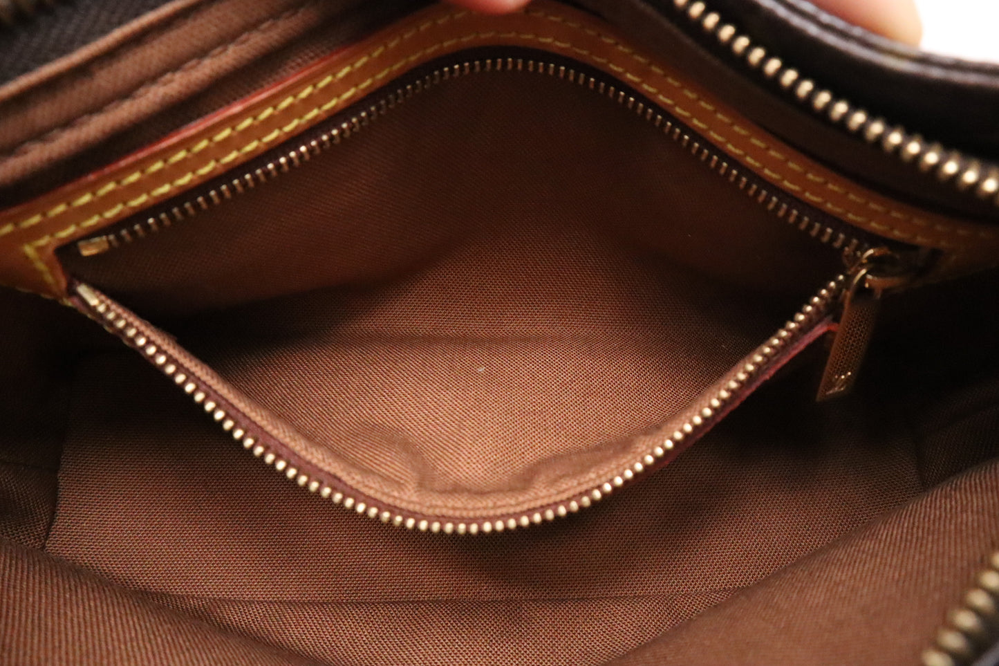 Louis Vuitton Trotteur in Monogram Canvas