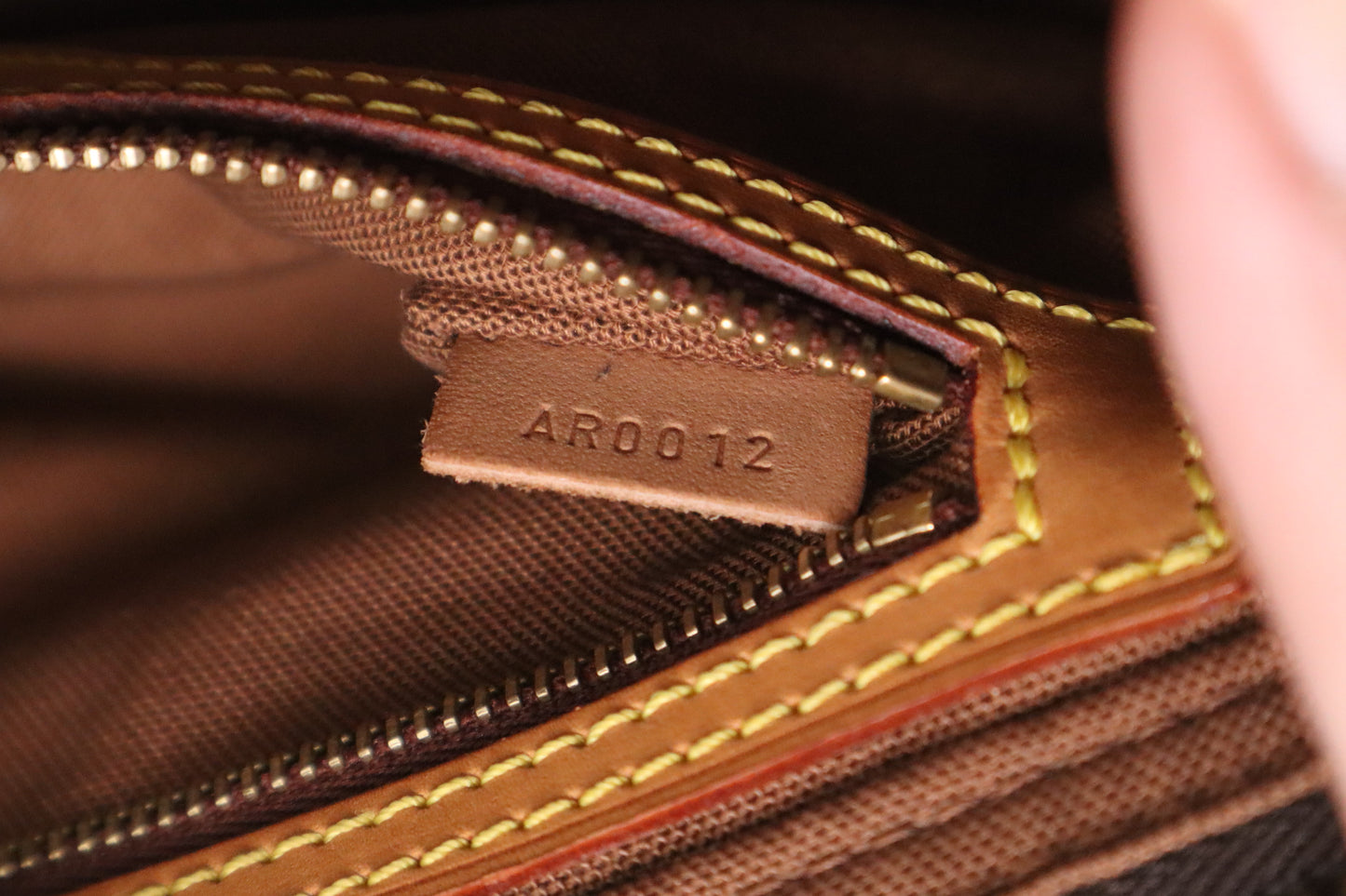 Louis Vuitton Trotteur in Monogram Canvas