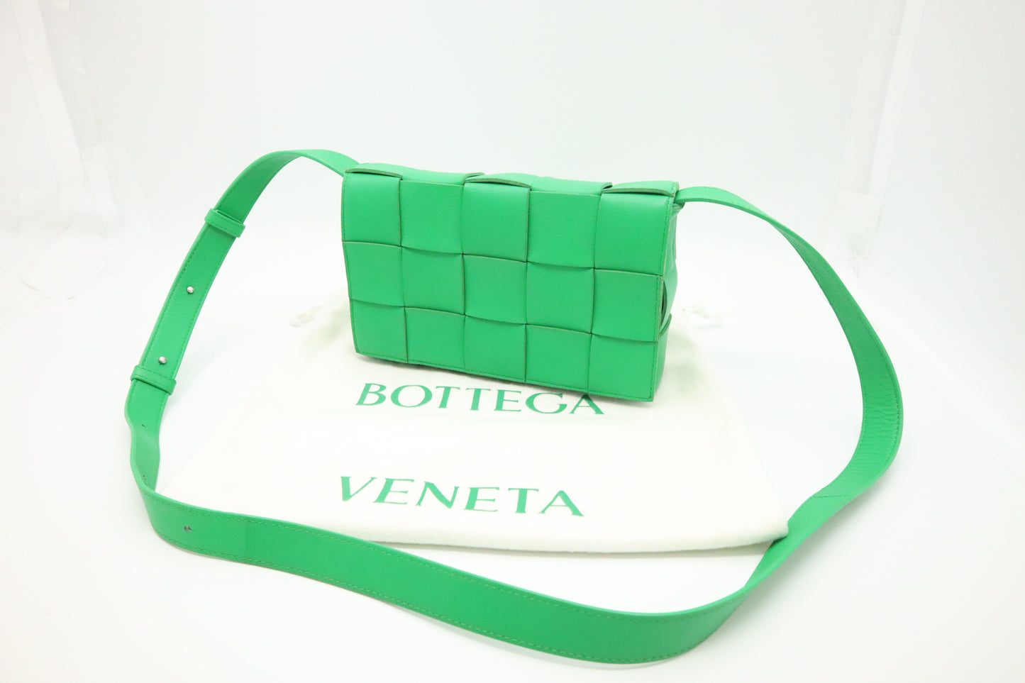 Bottega Veneta Cassette in Green Intrecciato Leather
