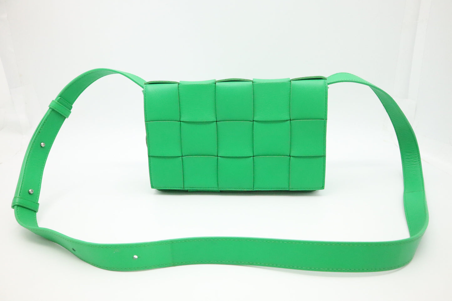 Bottega Veneta Cassette in Green Intrecciato Leather
