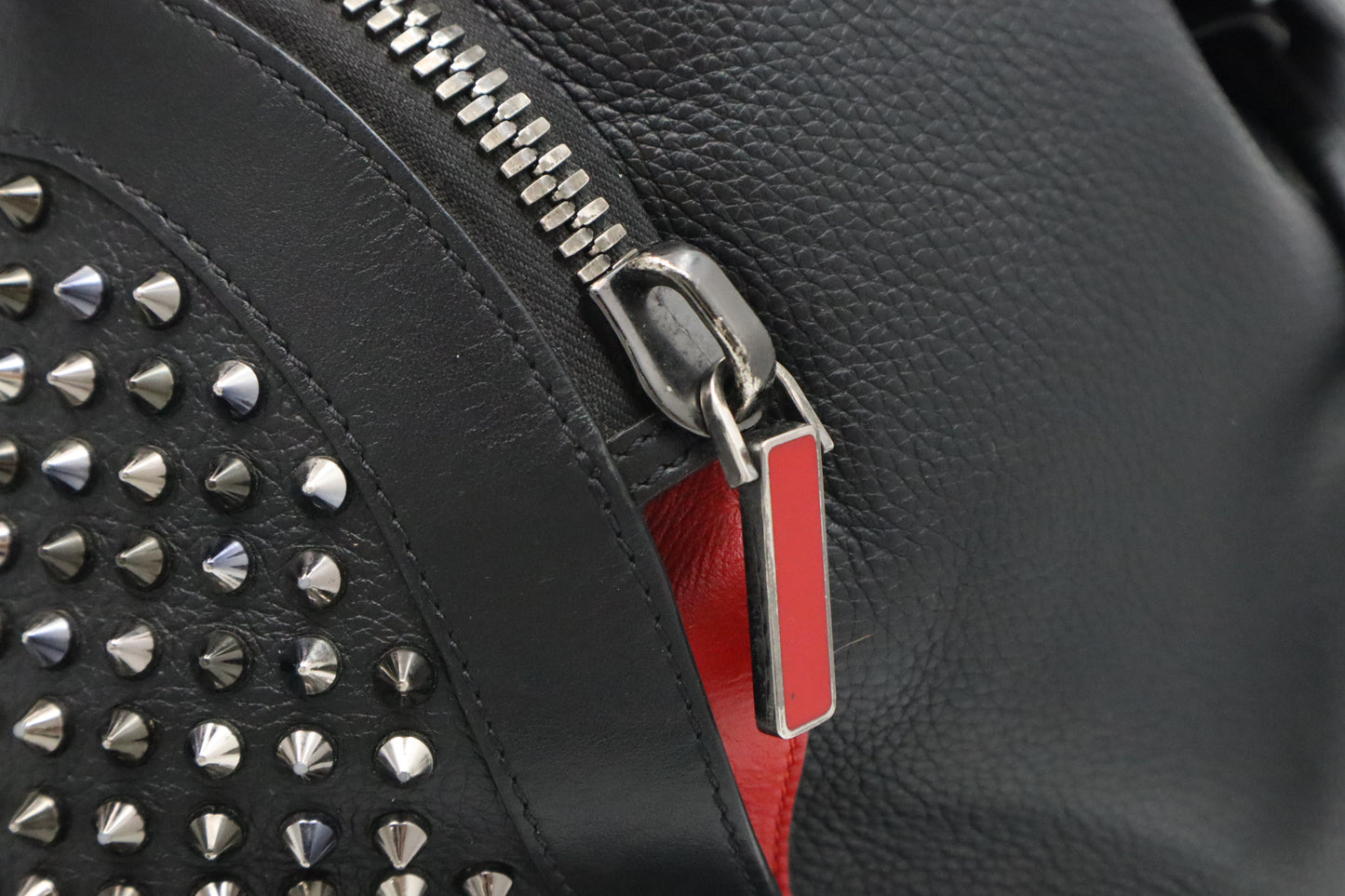 Louboutin Backpack in Black Studded Leather
