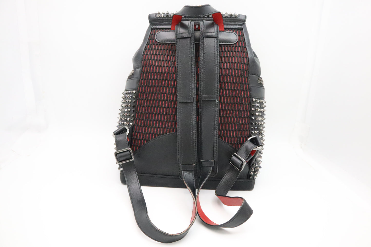 Louboutin Backpack in Black Studded Leather
