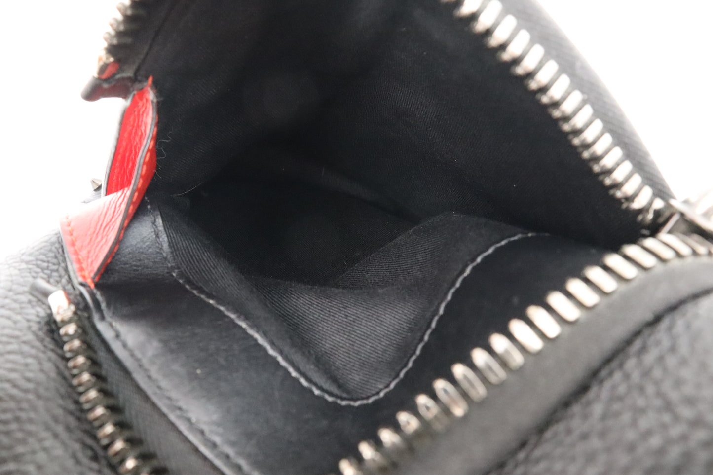 Louboutin Backpack in Black Studded Leather