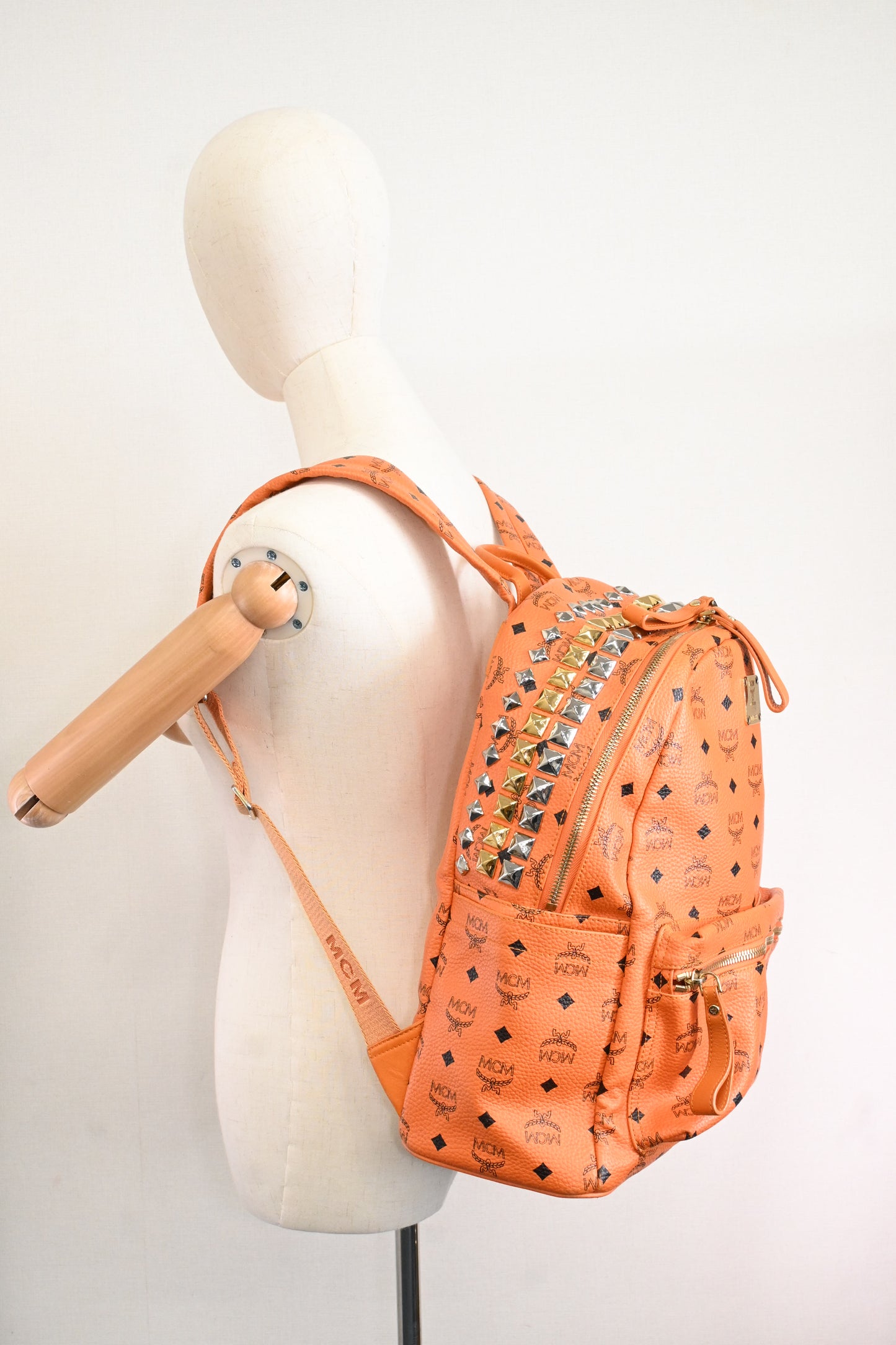 MCM Side Studs Medium Backpack in Orange Visetos Canvas