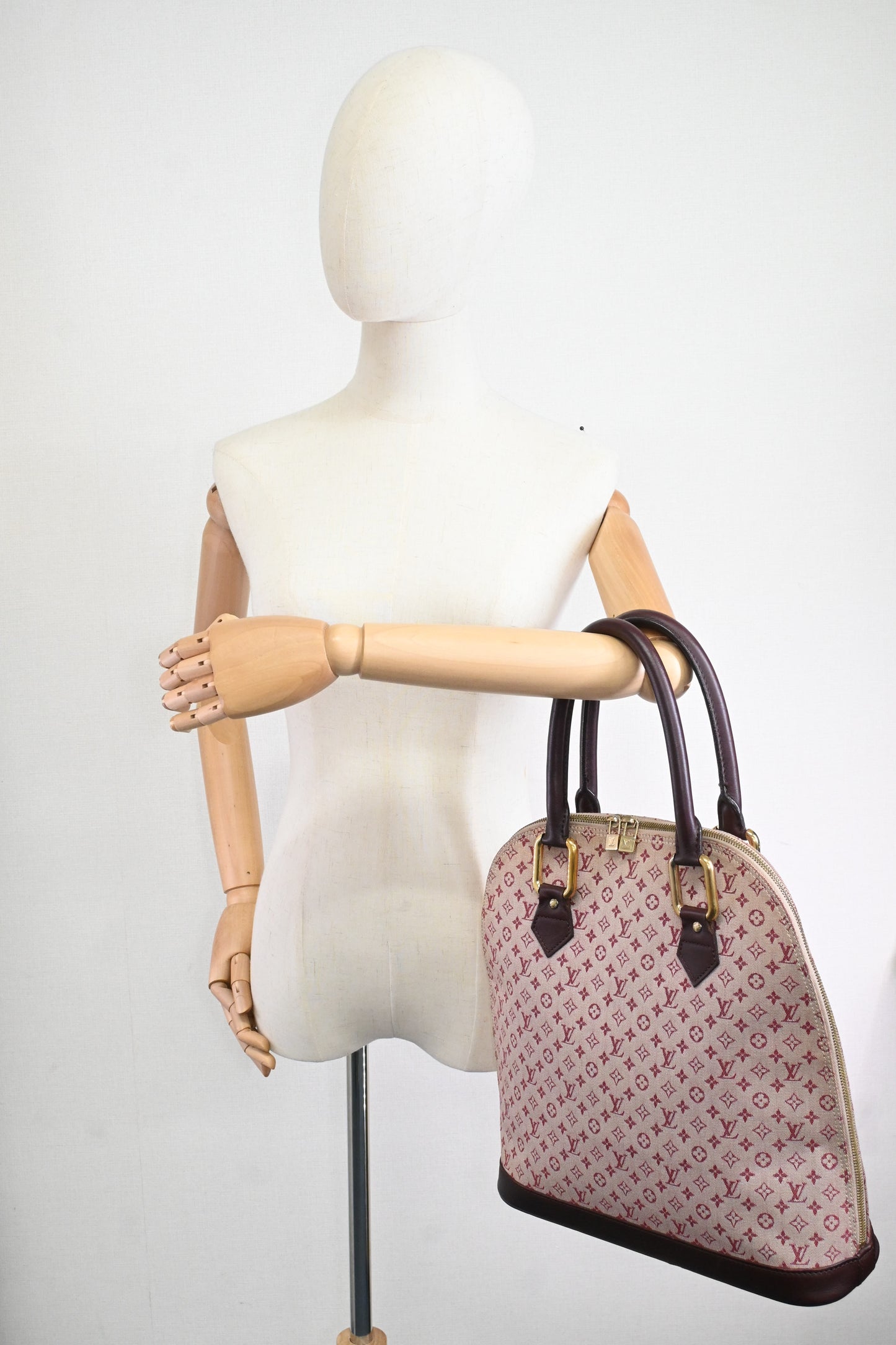 Louis Vuitton Alma Haut in Cerise Minilin Canvas