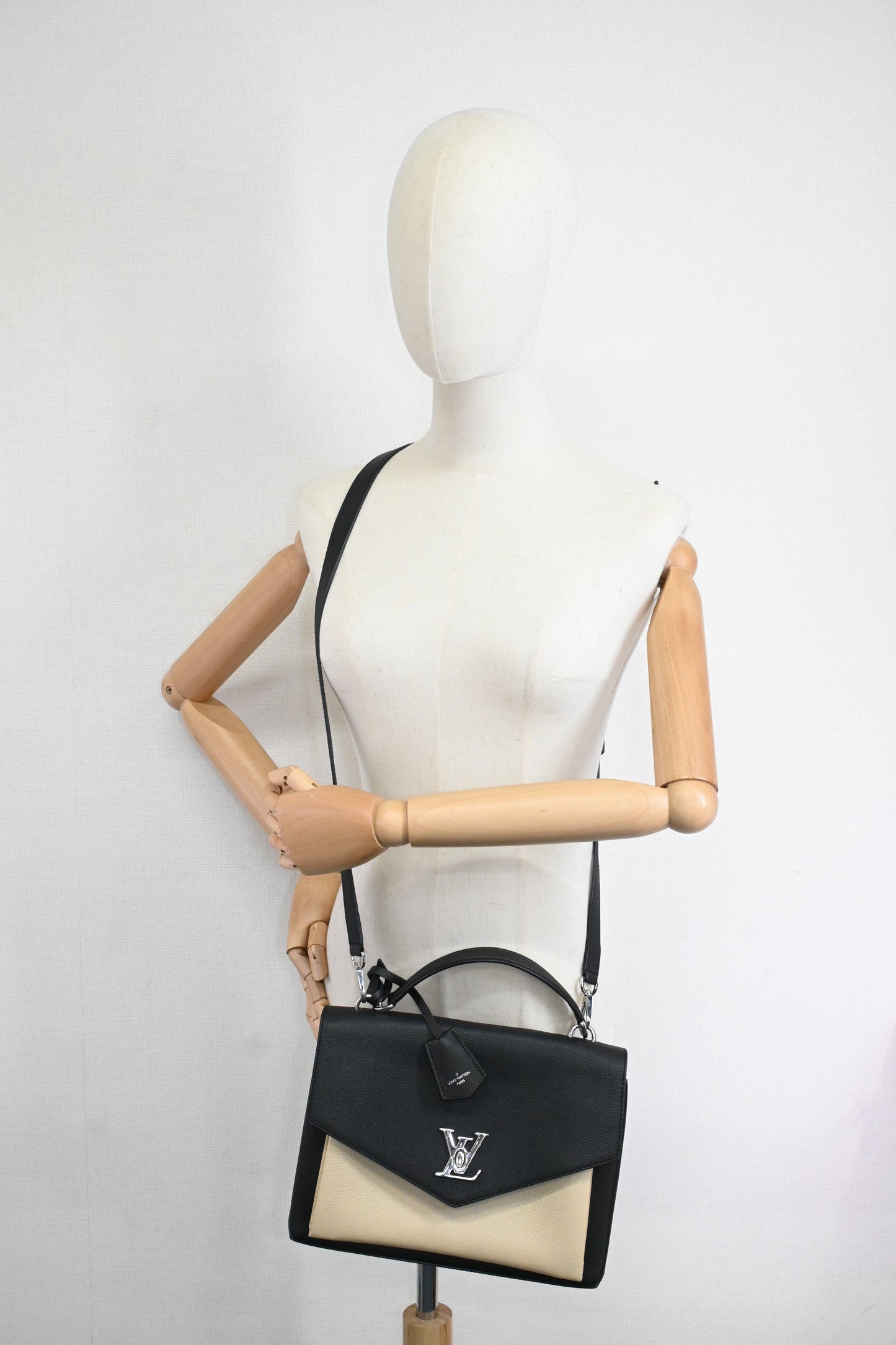 Louis Vuitton MyLockMe in Black and Cream Leather