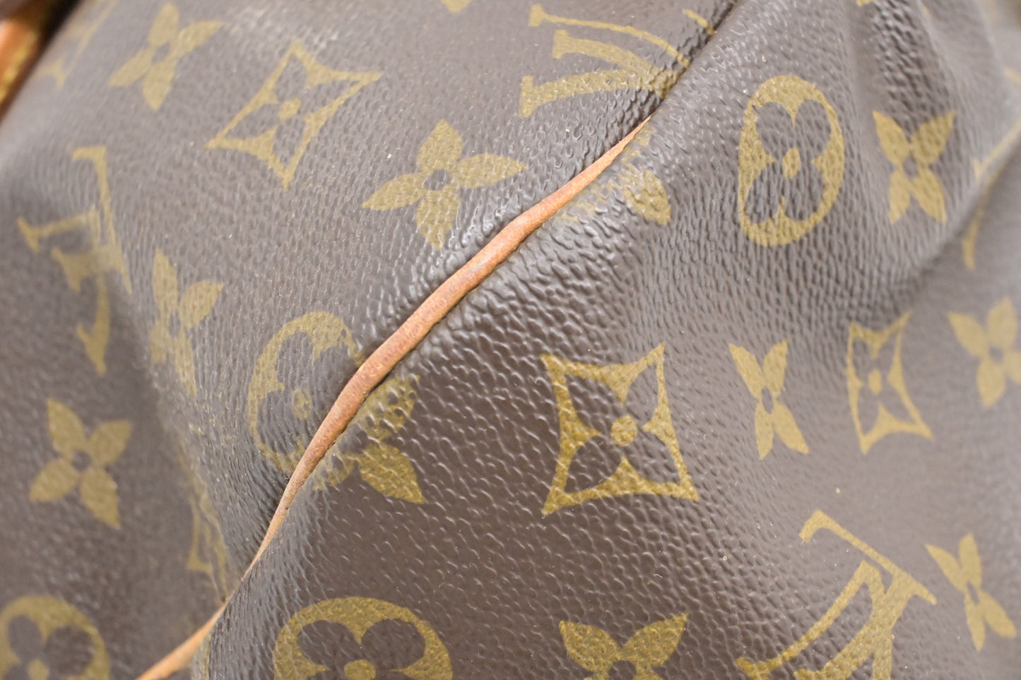 Louis Vuitton Saumur 43 in Monogram Canvas