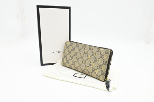 Gucci Bee Zippy Wallet in GG Supreme Canvas