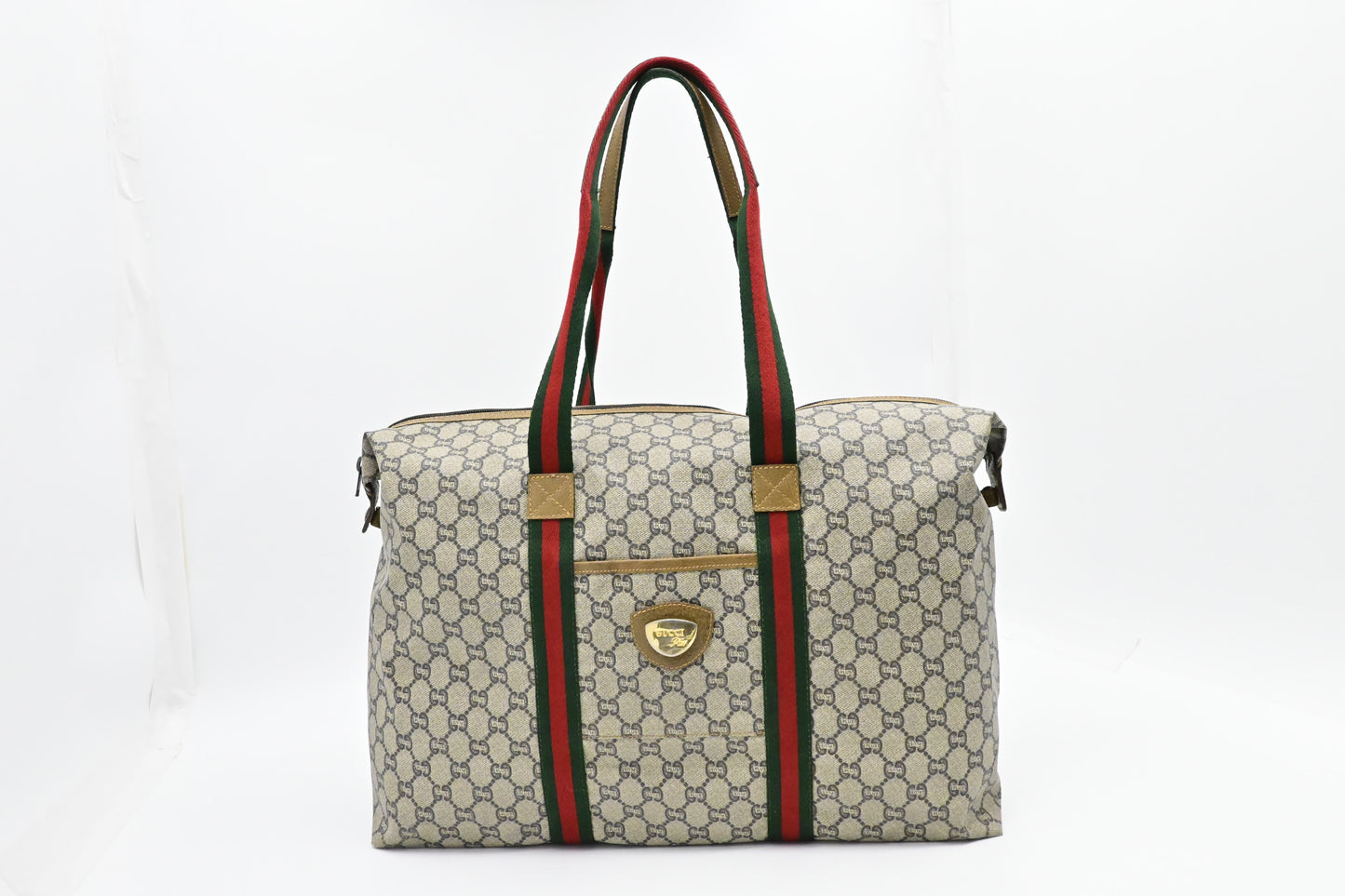 Gucci Plus Zipped Travel Bag in GG Plus Coated Canvas