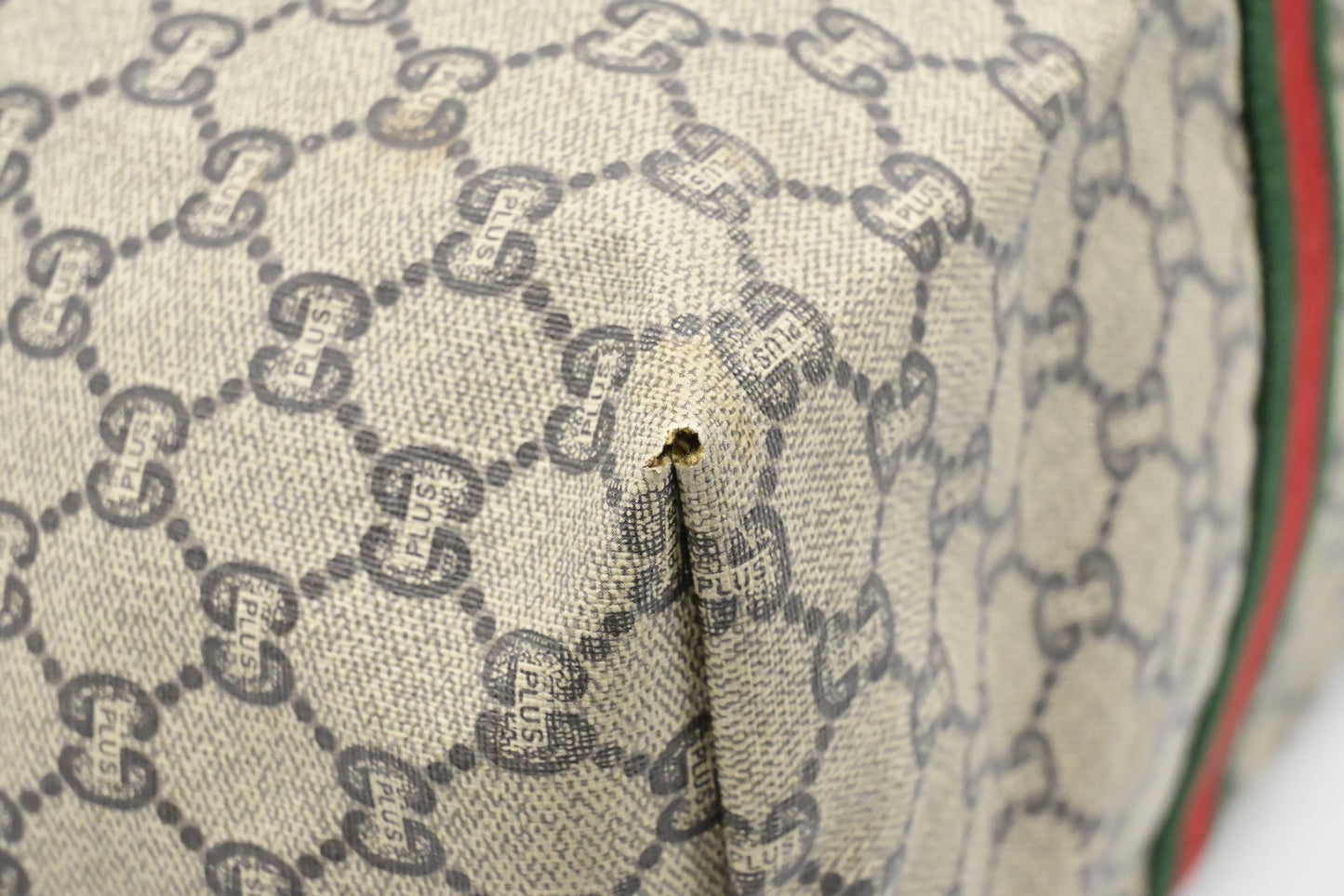 Gucci Plus Zipped Travel Bag in GG Plus Coated Canvas