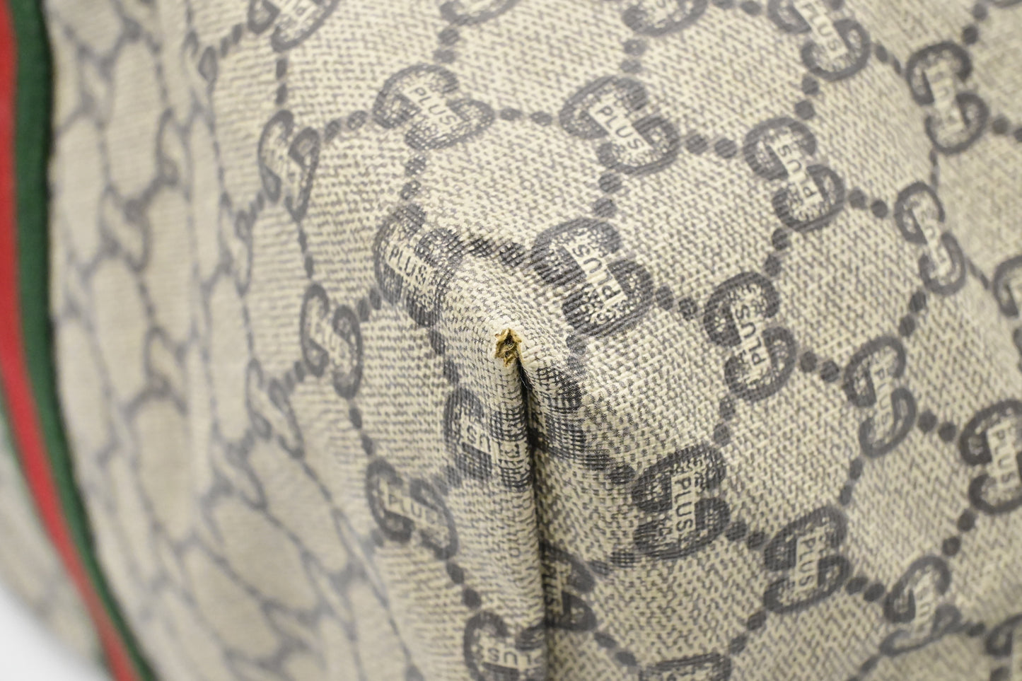 Gucci Plus Zipped Travel Bag in GG Plus Coated Canvas