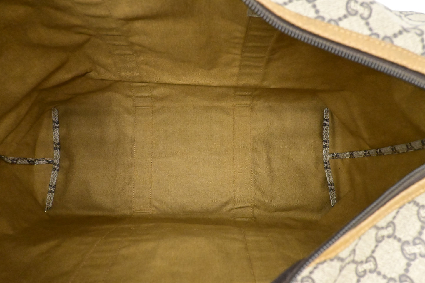 Gucci Plus Zipped Travel Bag in GG Plus Coated Canvas