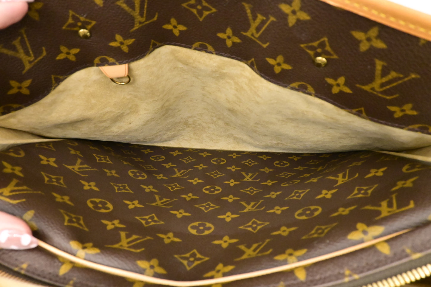 Louis Vuitton Rivoli in Monogram Canvas