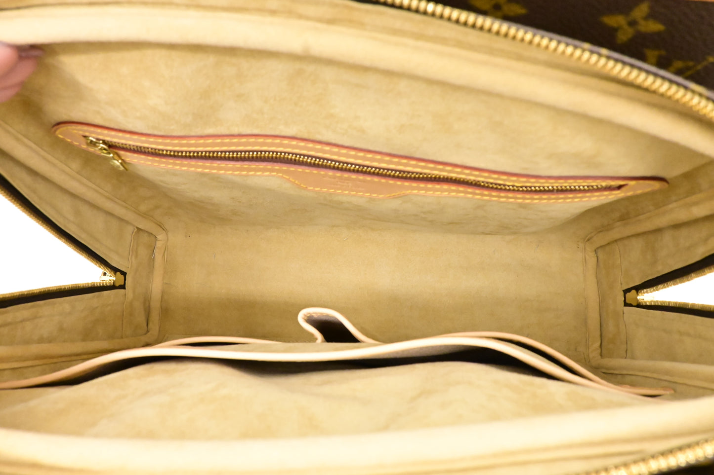 Louis Vuitton Rivoli in Monogram Canvas
