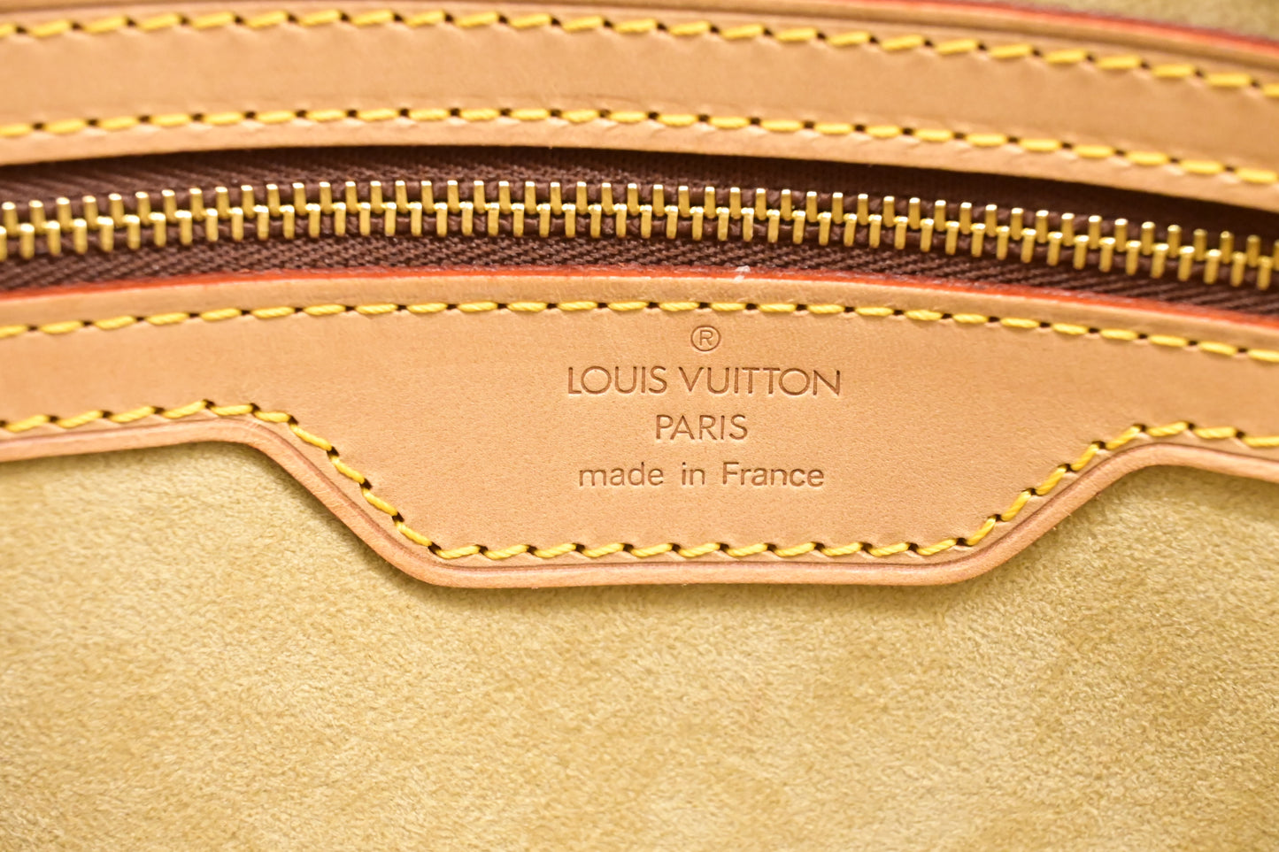 Louis Vuitton Rivoli in Monogram Canvas