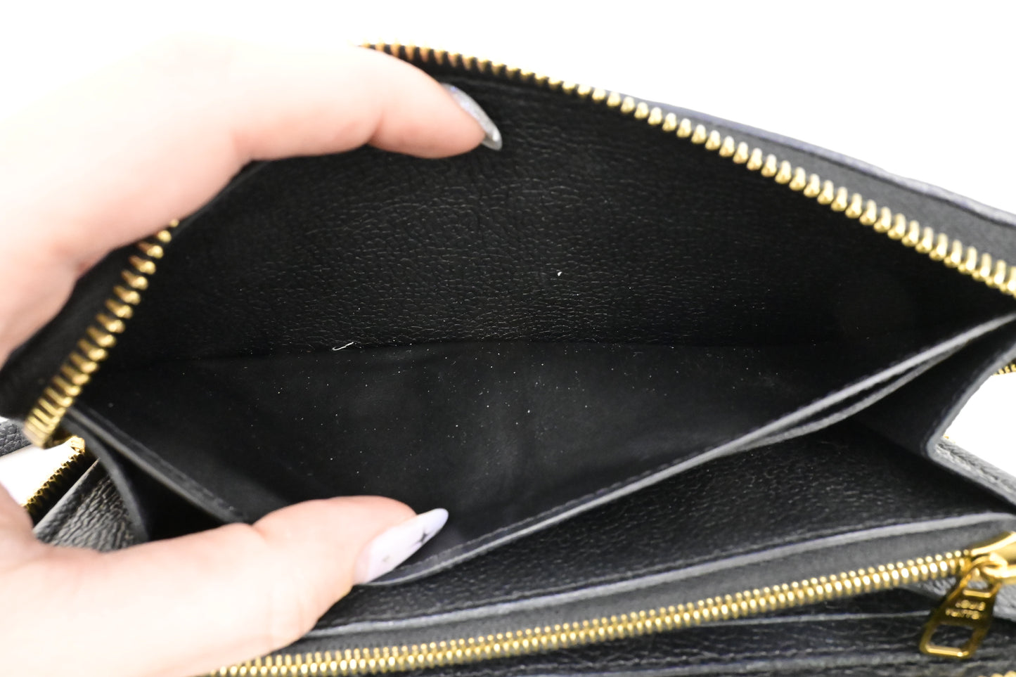 Louis Vuitton Clemence Wallet in Noir Empreinte Leather
