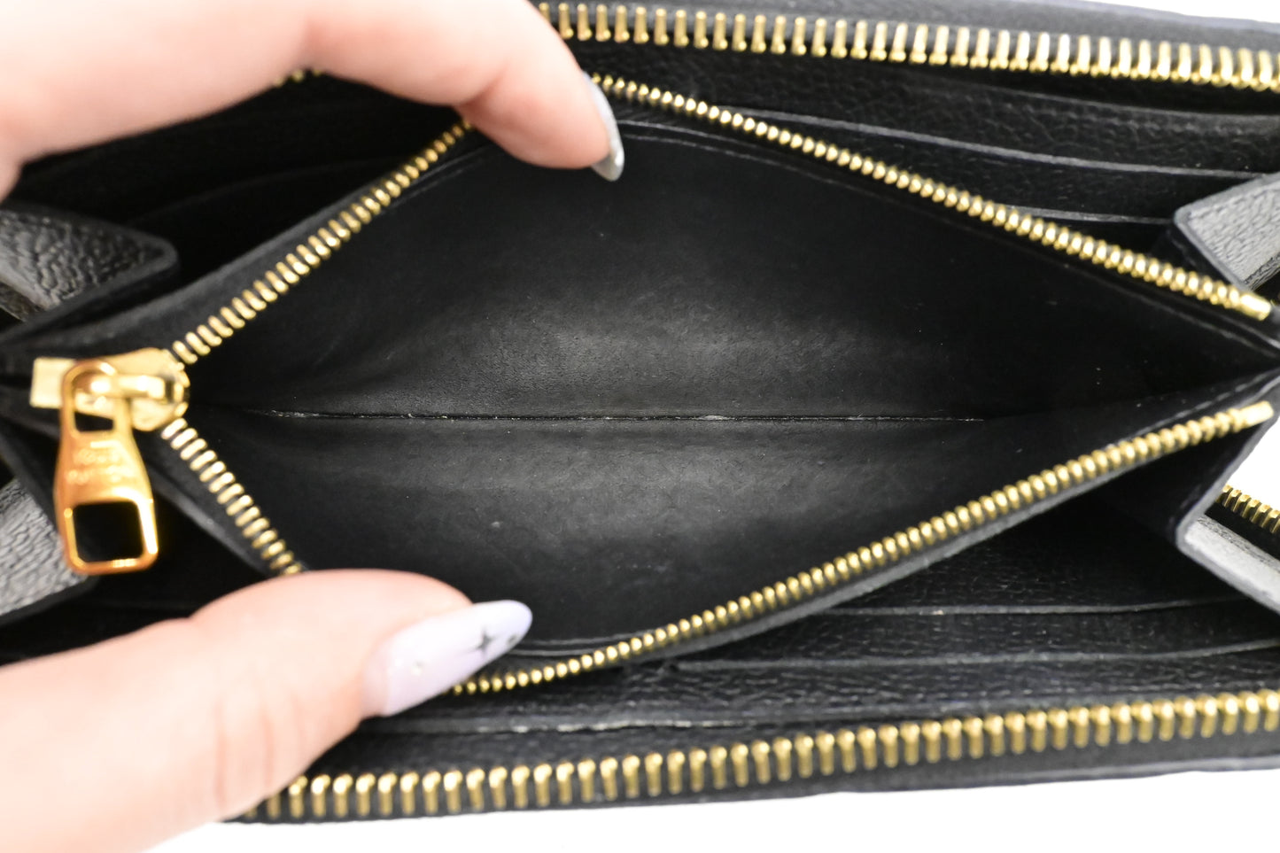Louis Vuitton Clemence Wallet in Noir Empreinte Leather