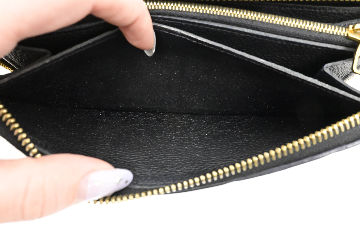 Louis Vuitton Clemence Wallet in Noir Empreinte Leather