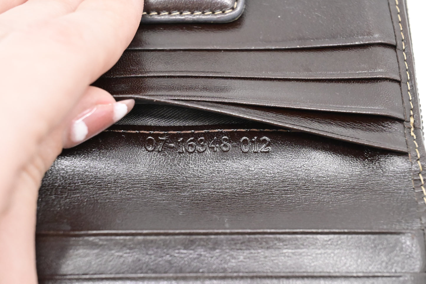 Fendi Compact Zippy Wallet in Zucca Patent Leather