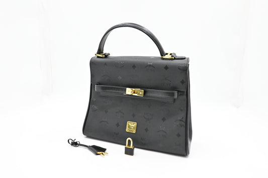MCM Medium Kelly in Black Coated Canvas