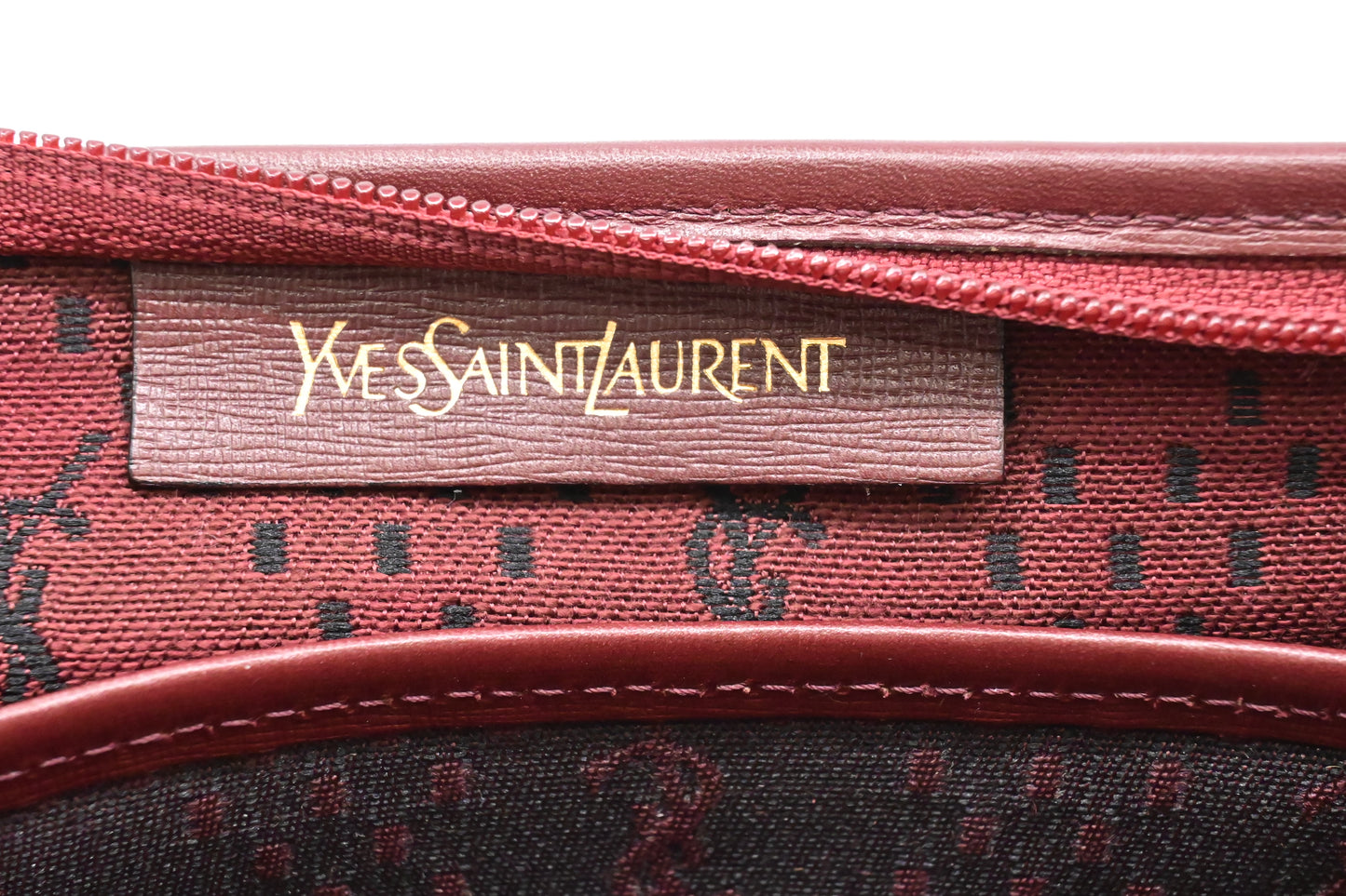 YSL Saint Laurent Clutch in Burgundy Coated Canvas