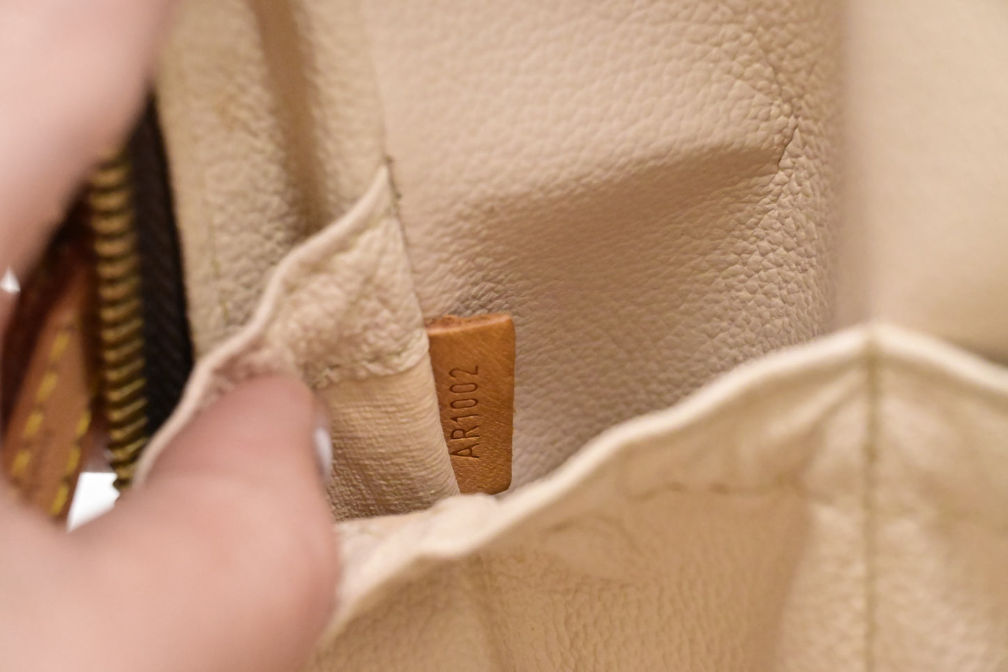 Louis Vuitton Spontini in Monogram Canvas