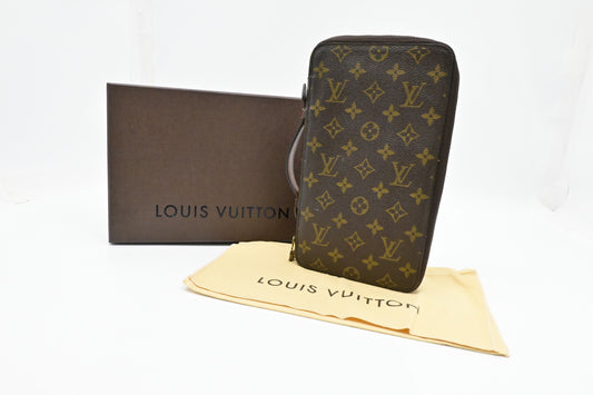 Louis Vuitton Poche Escapade in Monogram Canvas