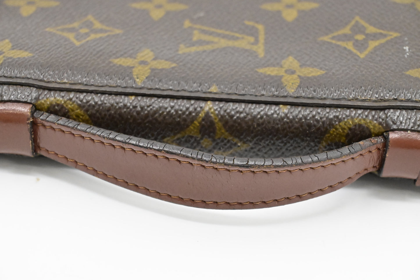 Louis Vuitton Poche Escapade in Monogram Canvas
