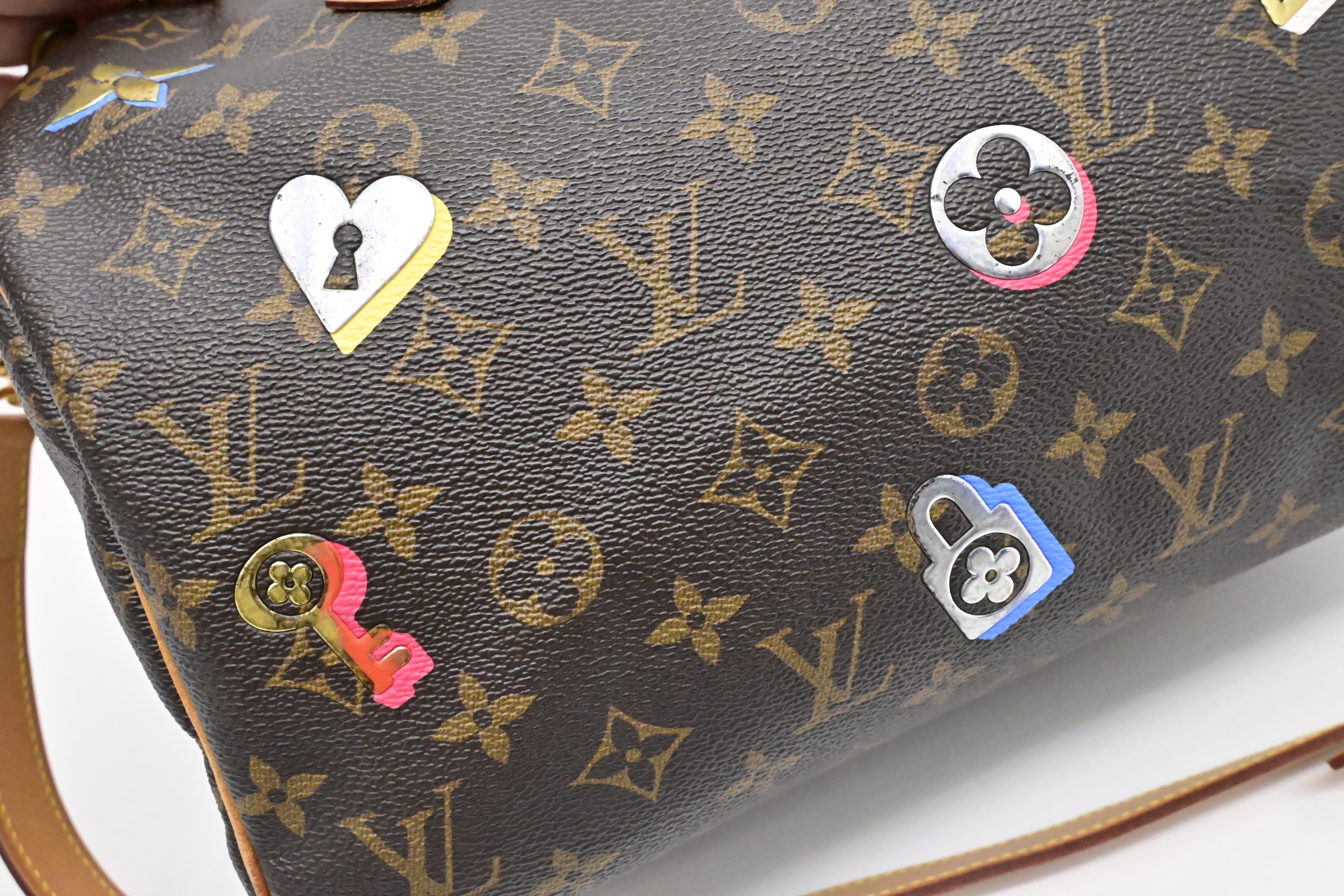 Louis Vuitton Speedy 30 Bandouliere in Love Lock Monogram Canvas