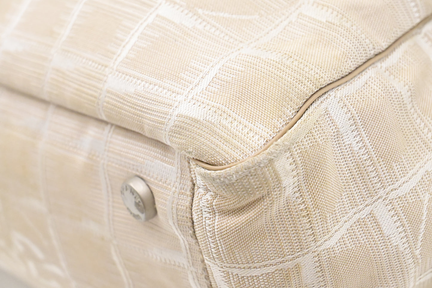 Chanel New Travel Line Zip Tote in Champagne Canvas