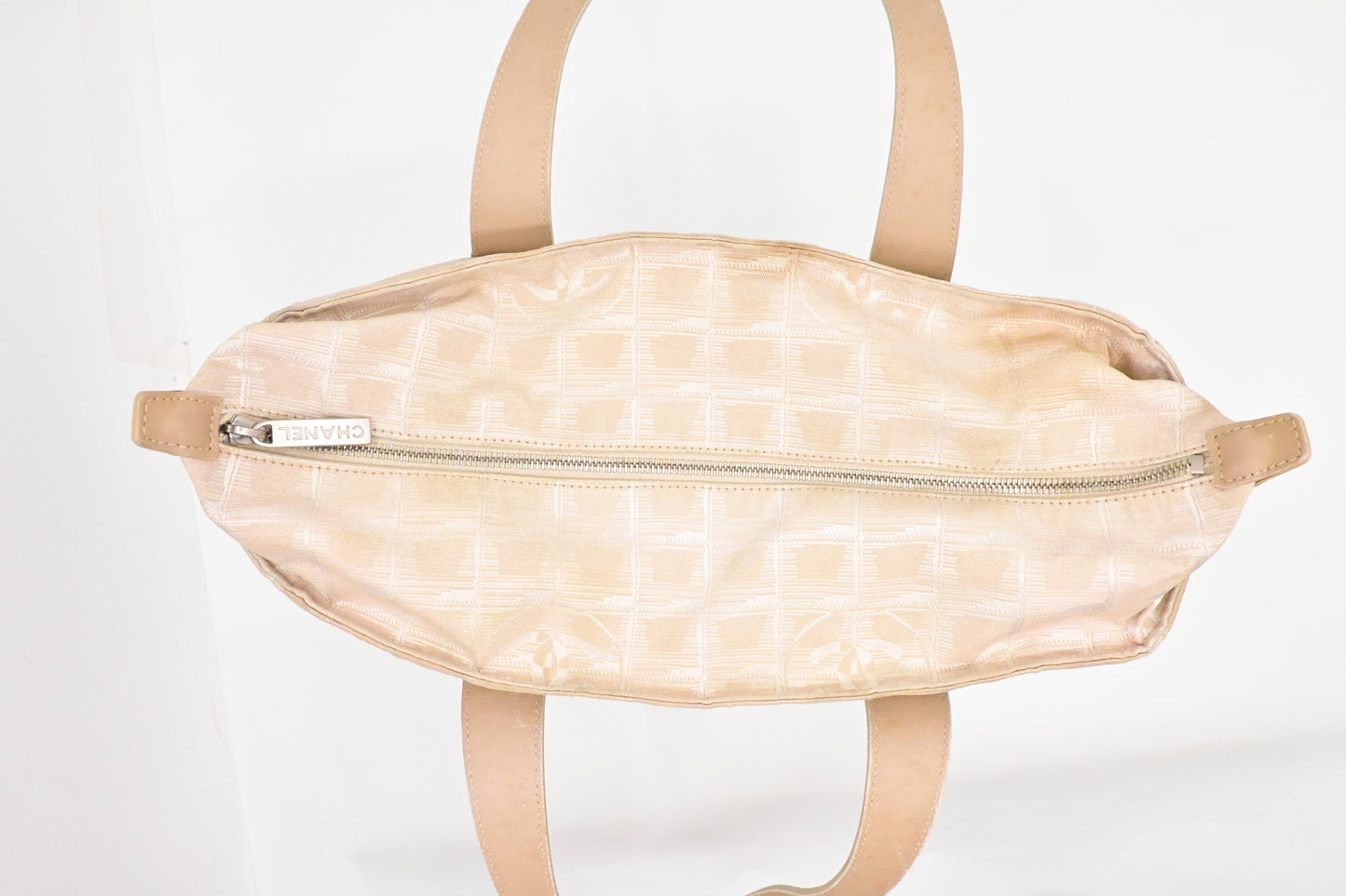 Chanel New Travel Line Zip Tote in Champagne Canvas