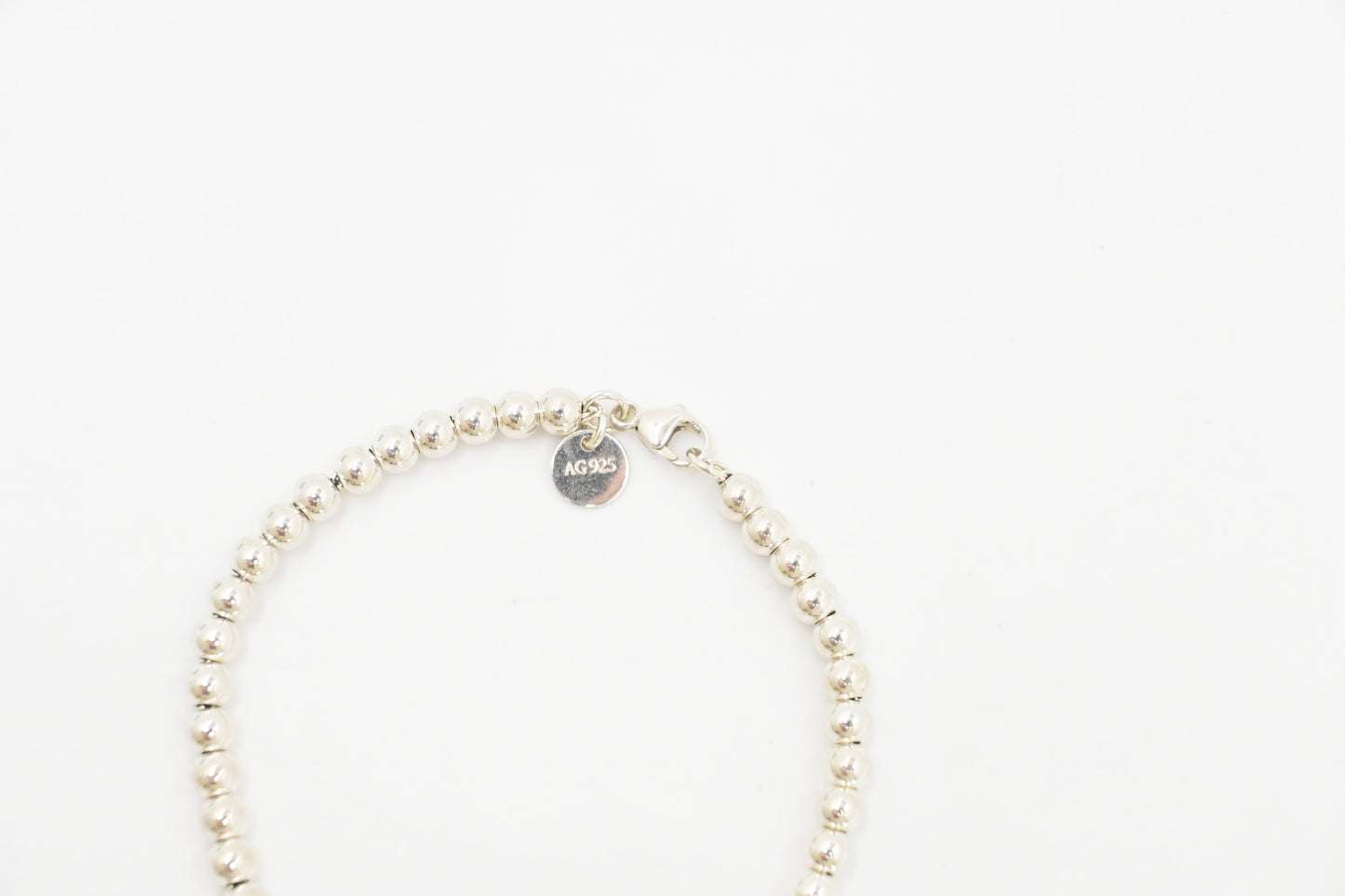Tiffany & Co. Round Heart Charm Bracelet in Sterling Silver