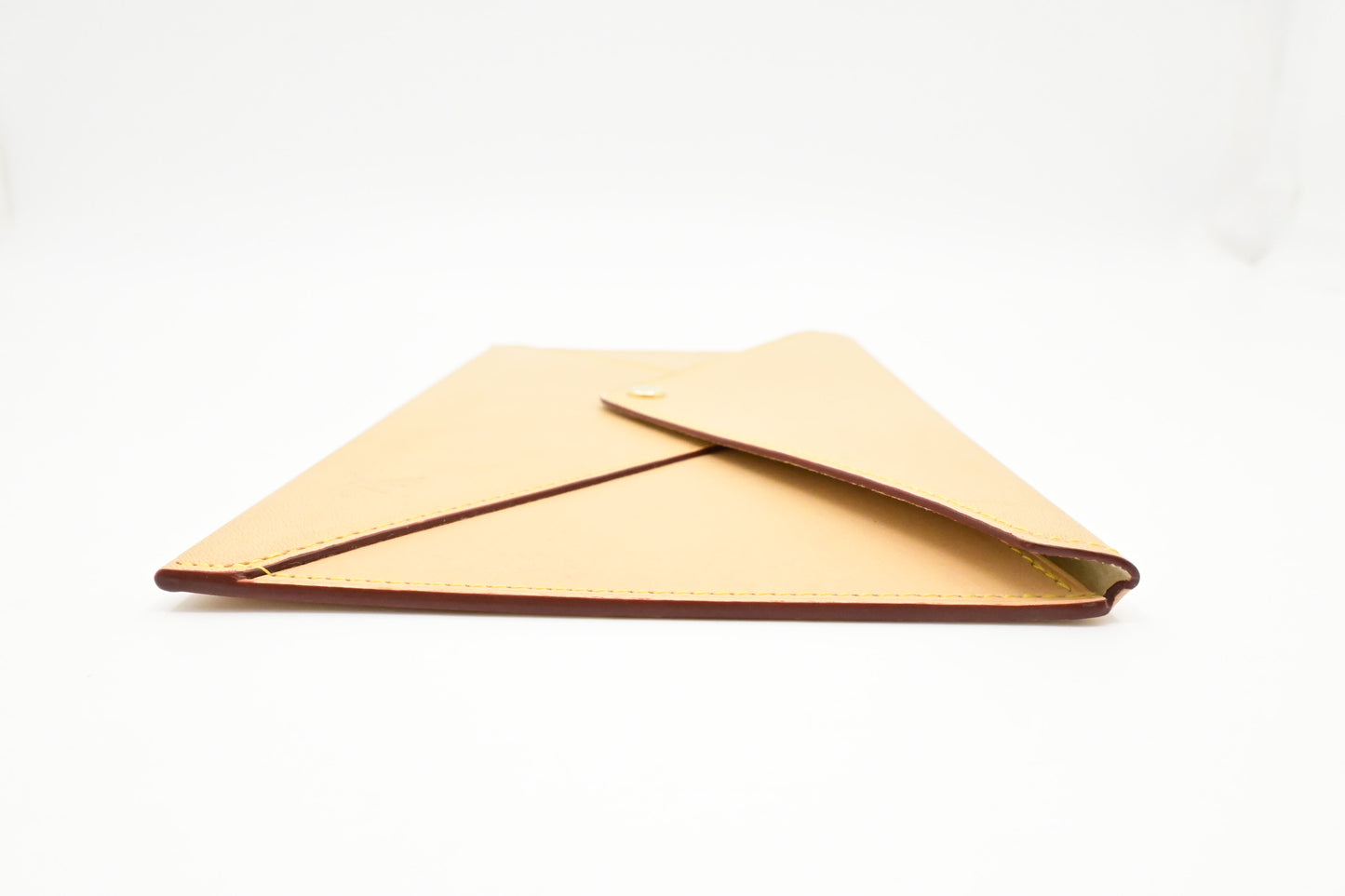 Louis Vuitton Envelope Clutch in Nomade Leather