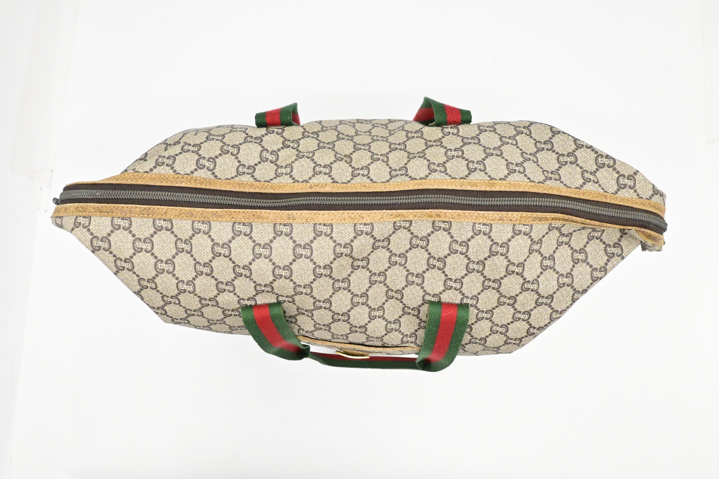 Gucci Plus Zip Tote in GG Plus Coated Canvas