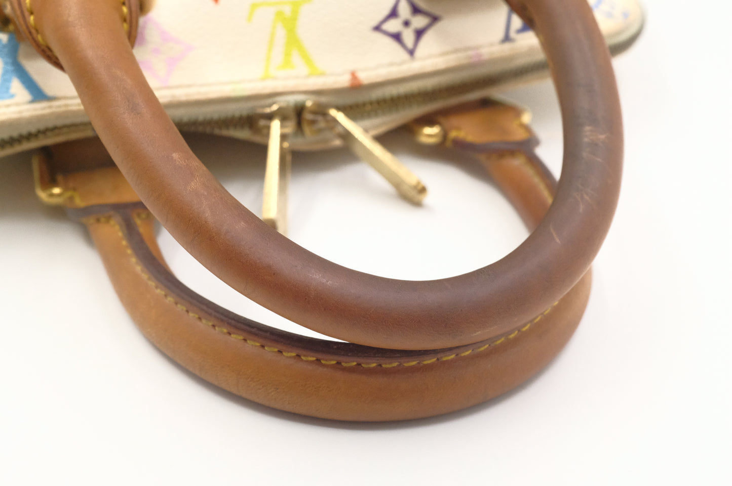 Louis Vuitton Alma PM in White Multicolor Monogram Canvas