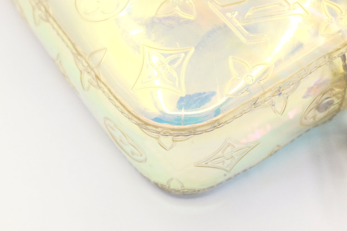 Louis Vuitton Pochette Volga in Prism Monogram PVC
