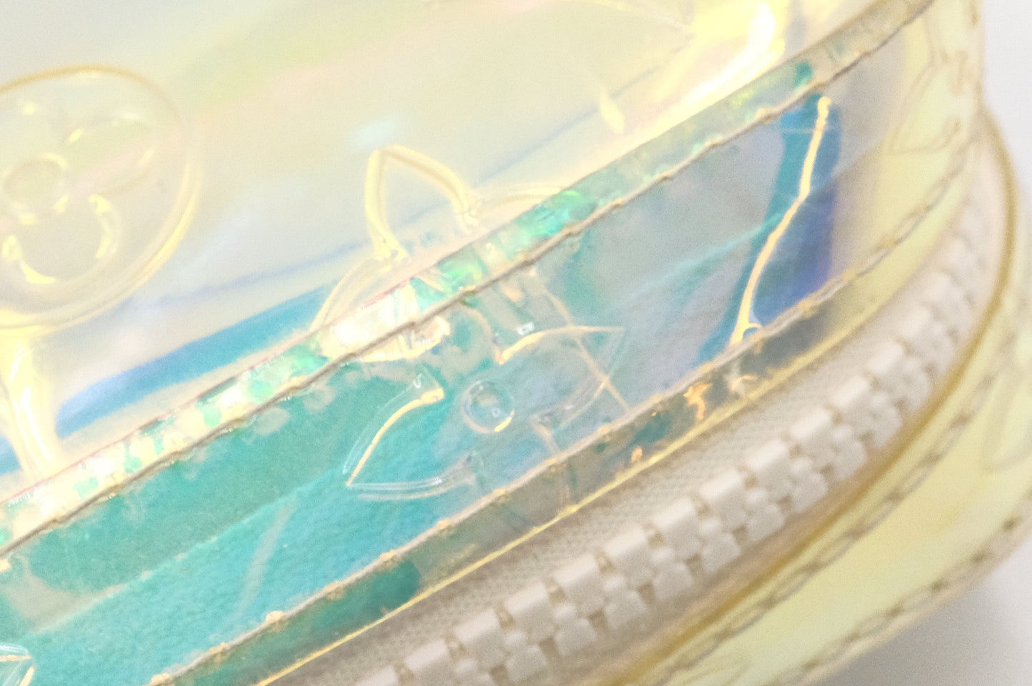 Louis Vuitton Pochette Volga in Prism Monogram PVC
