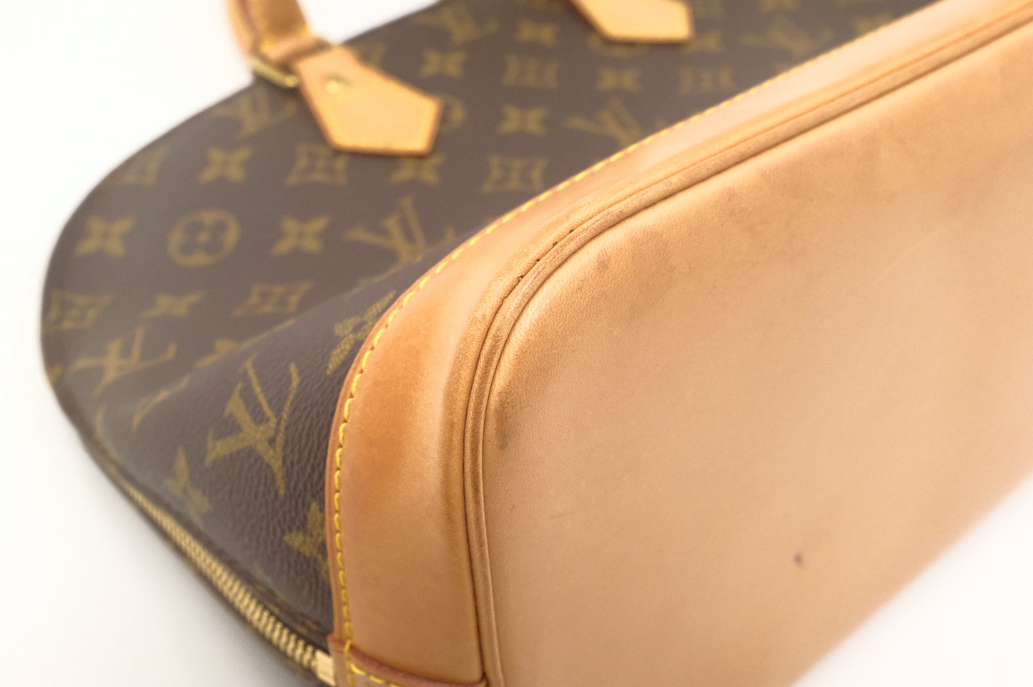 Louis Vuitton Alma PM in Monogram Canvas
