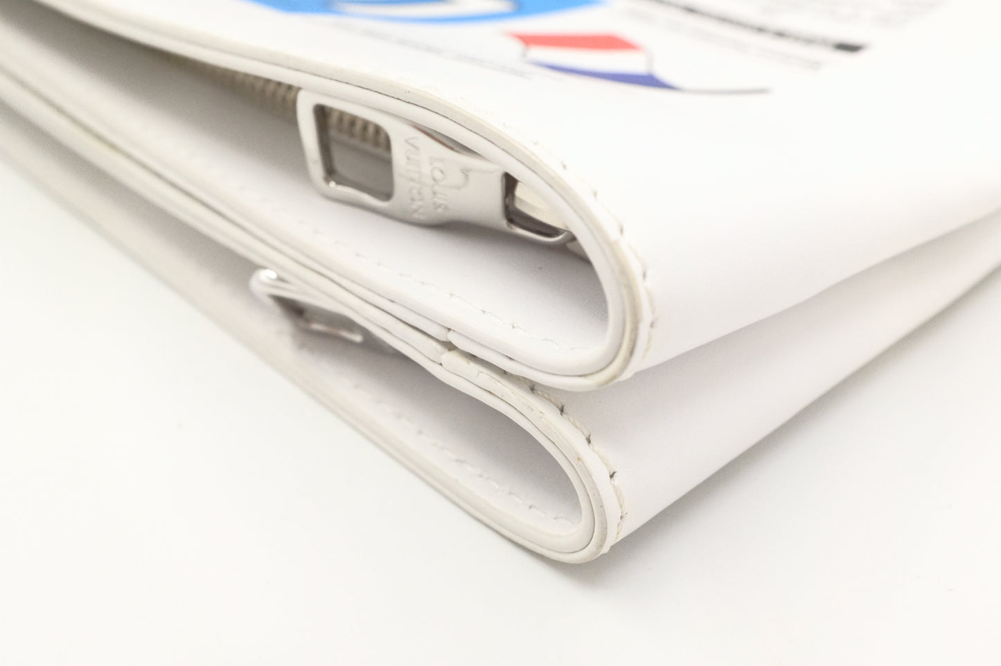 Louis Vuitton Newspaper Clutch