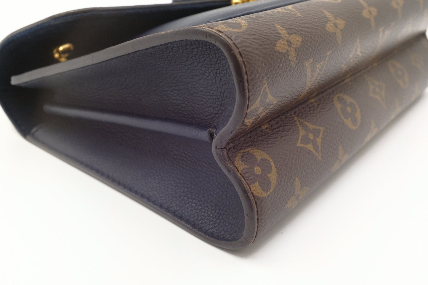 Louis Vuitton Victoire in Monogram Canvas & Blue Leather