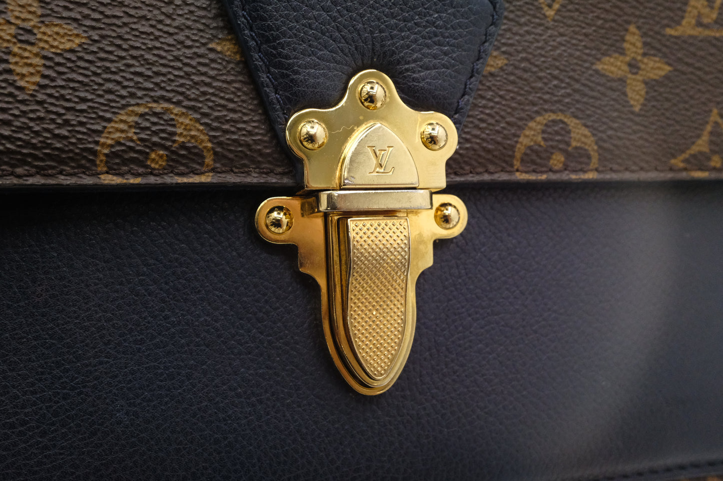 Louis Vuitton Victoire in Monogram Canvas & Blue Leather