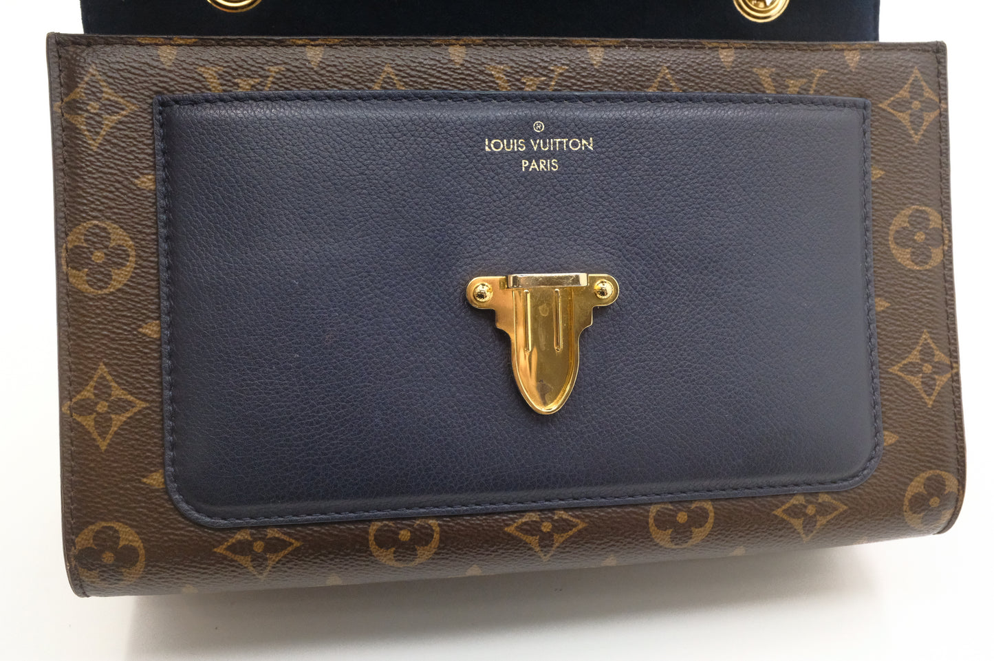 Louis Vuitton Victoire in Monogram Canvas & Blue Leather