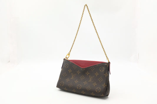 Louis Vuitton Pallas Clutch in Monogram Canvas and Red Leather
