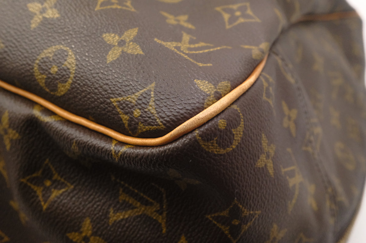 Louis Vuitton Evasion in Monogram Canvas