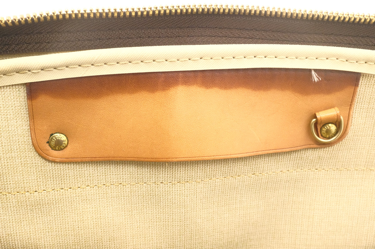 Louis Vuitton Evasion in Monogram Canvas