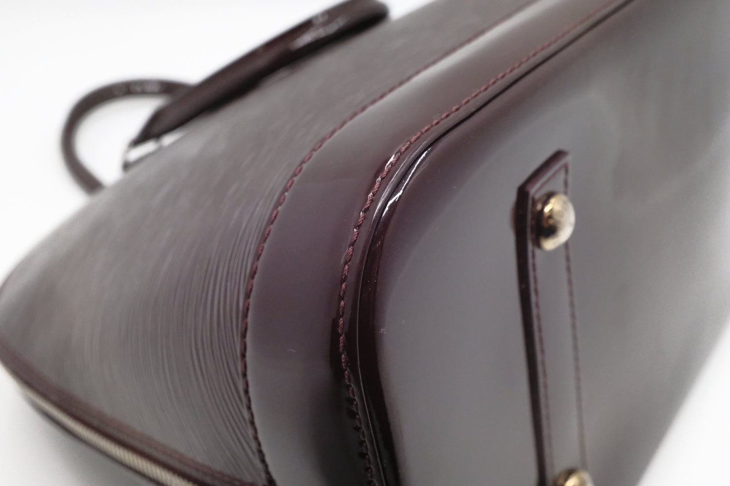 Louis Vuitton Alma GM in Burgundy Electric Epi Leather