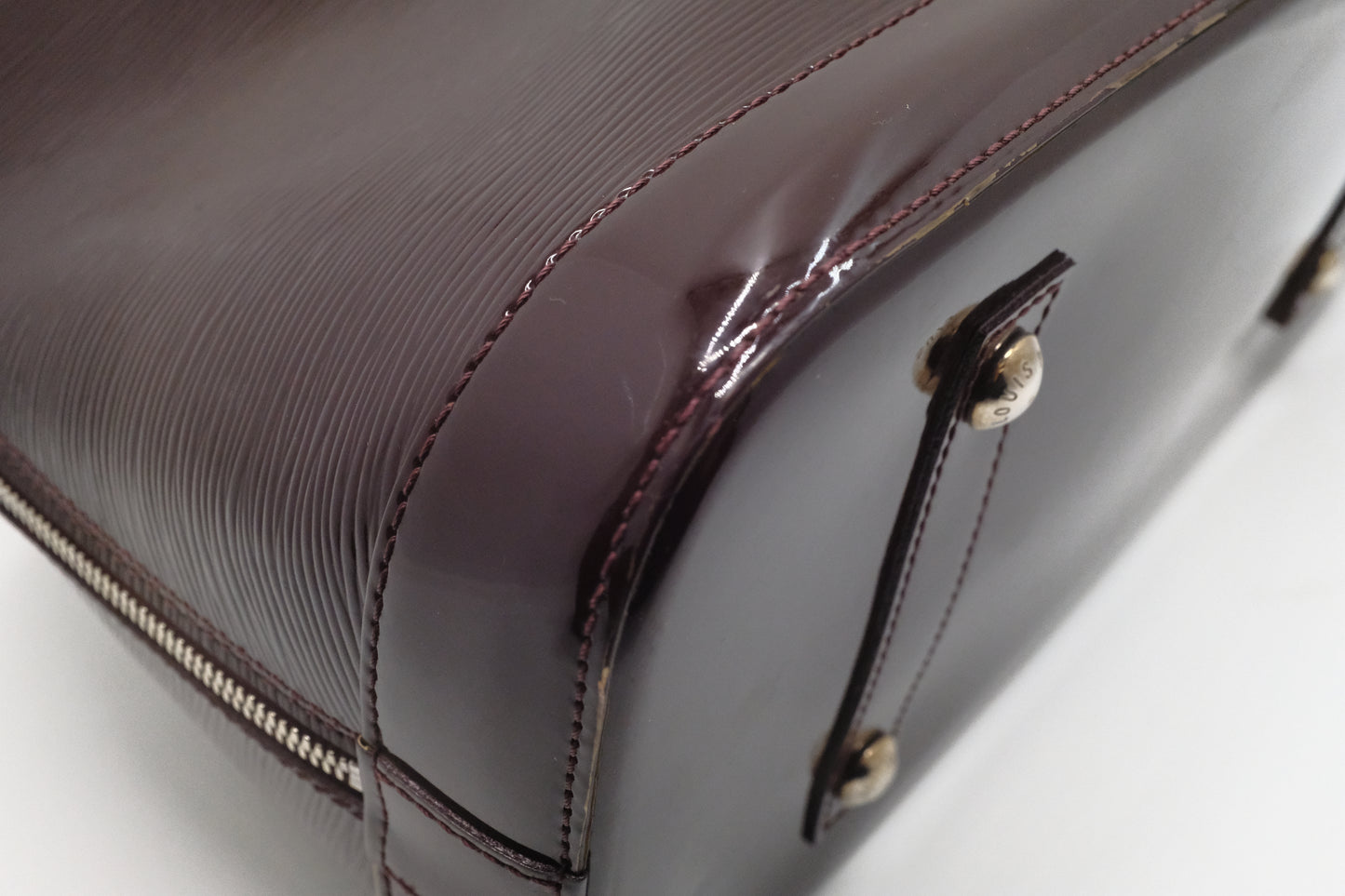 Louis Vuitton Alma GM in Burgundy Electric Epi Leather